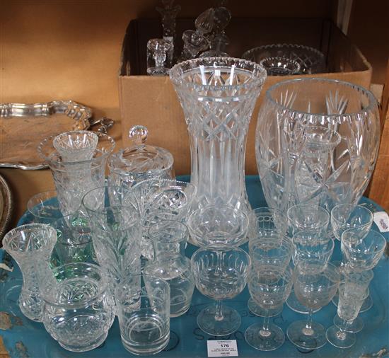 Large group of cut glass decanters, vases and bowls